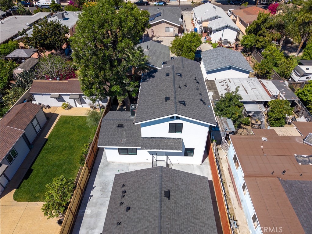 13003 Kamloops Street Pacoima, CA 91331 - Photo 66 of 66 an aerial view of a house with a yard