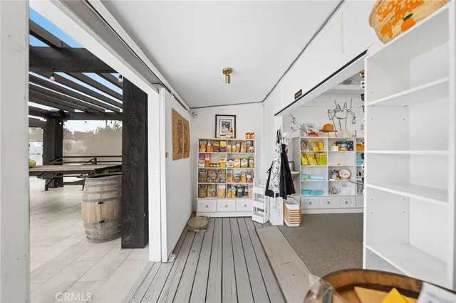 a view of a backyard with sitting area