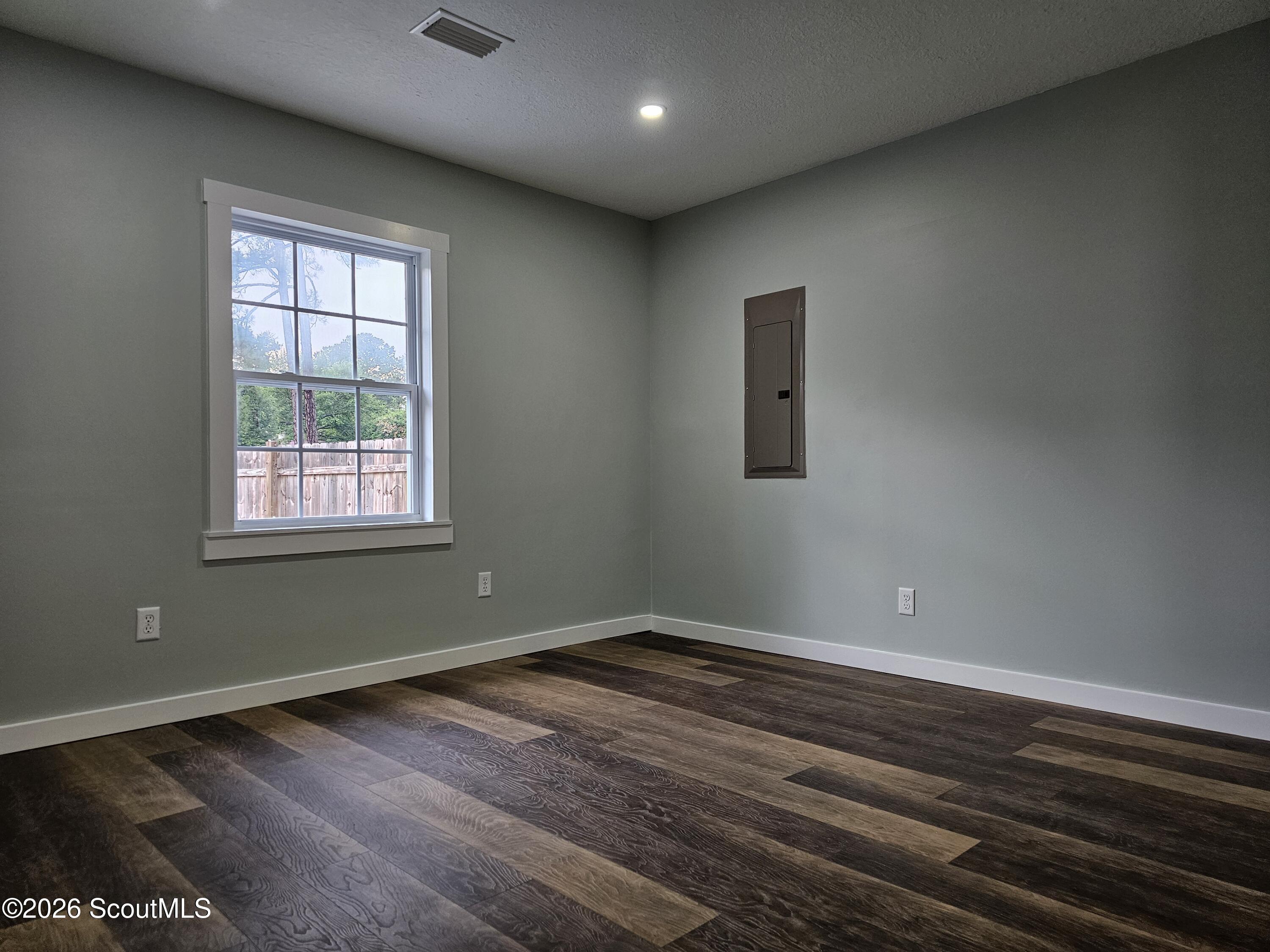 101 Dover Circle Brunswick, GA 31525 - Photo 14 of 32 This bedroom is accessed from the laundry room which has a separate side entrance. This bedroom has a street facing window.