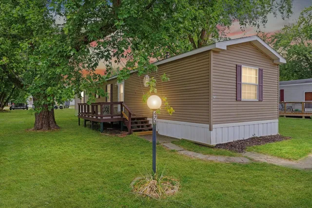 a house view with a garden space