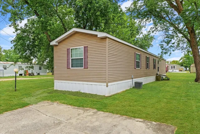 a view of a backyard with a garden