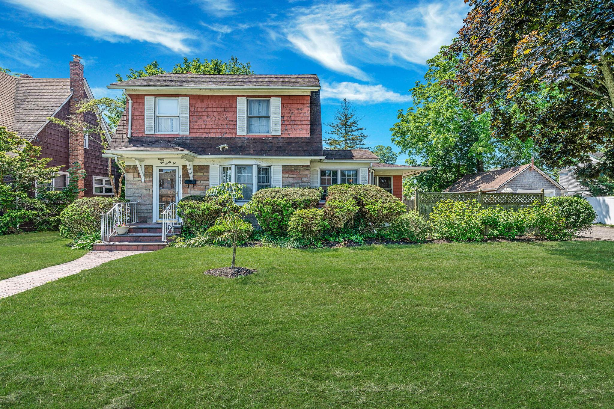 View of front of house featuring stone siding