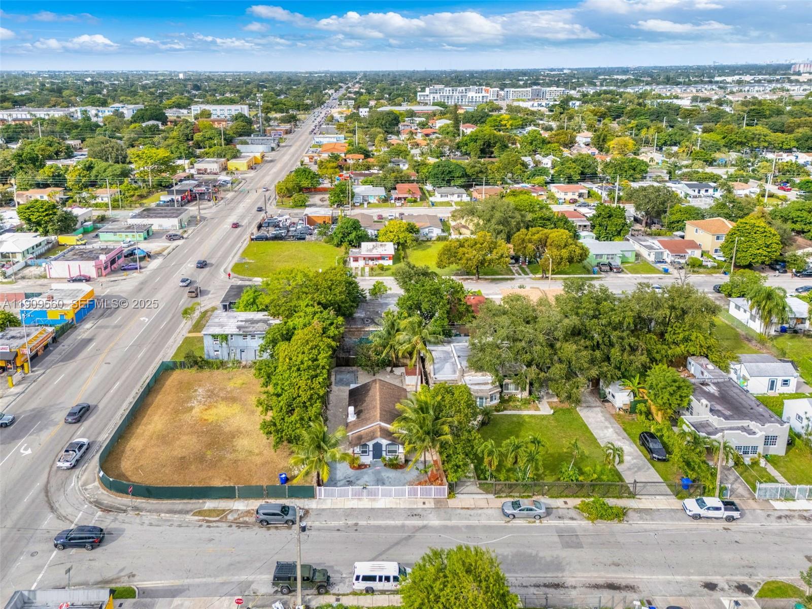 1621 Northwest 55th Street Miami, FL 33142 - Photo 20 of 24 an aerial view of residential houses with outdoor space and street view