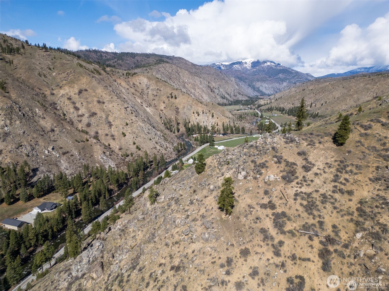 12 Entiat River Road Entiat, WA 98822 - Photo 21 of 22 a view of a dry field with mountains in the background