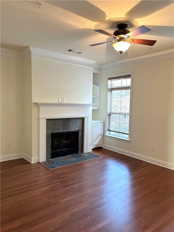 621 Perimeter Walk Atlanta, GA 30338 - Photo 3 of 20 a view of an empty room with wooden floor fireplace and a window