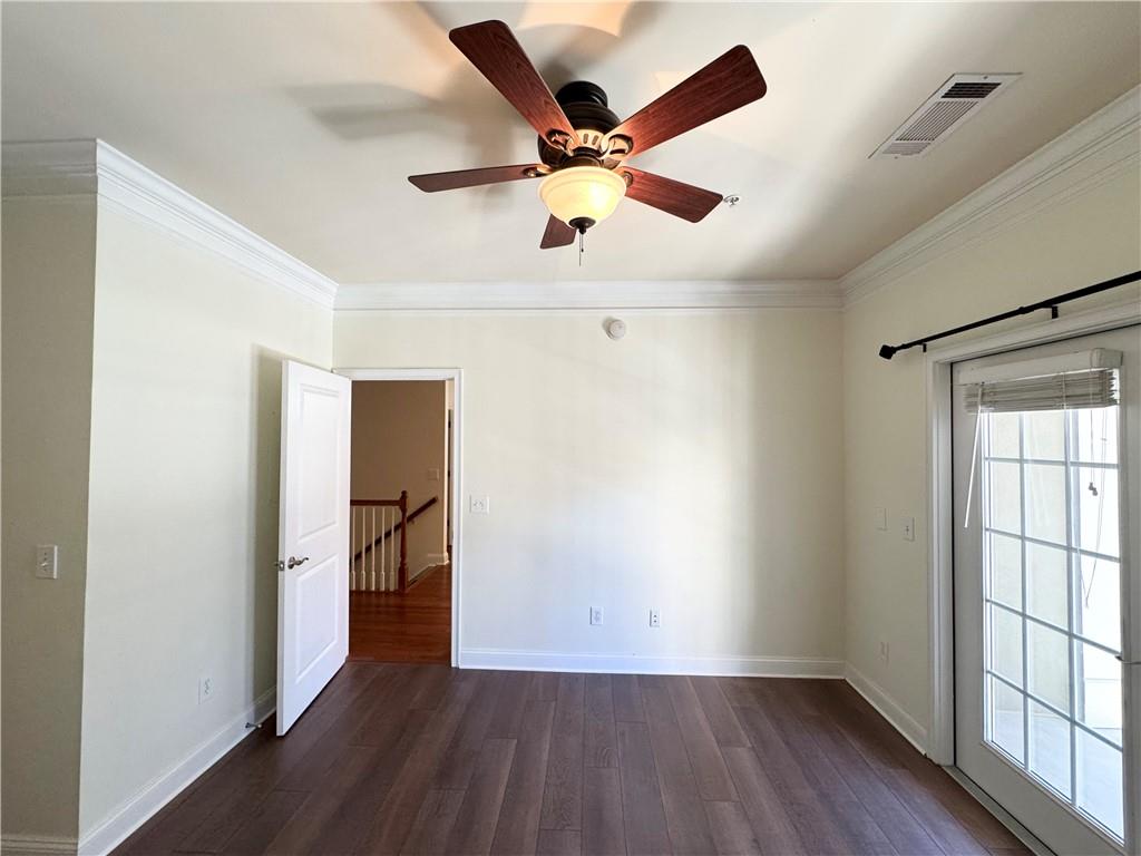 621 Perimeter Walk Atlanta, GA 30338 - Photo 10 of 20 wooden floor in an empty room with a window
