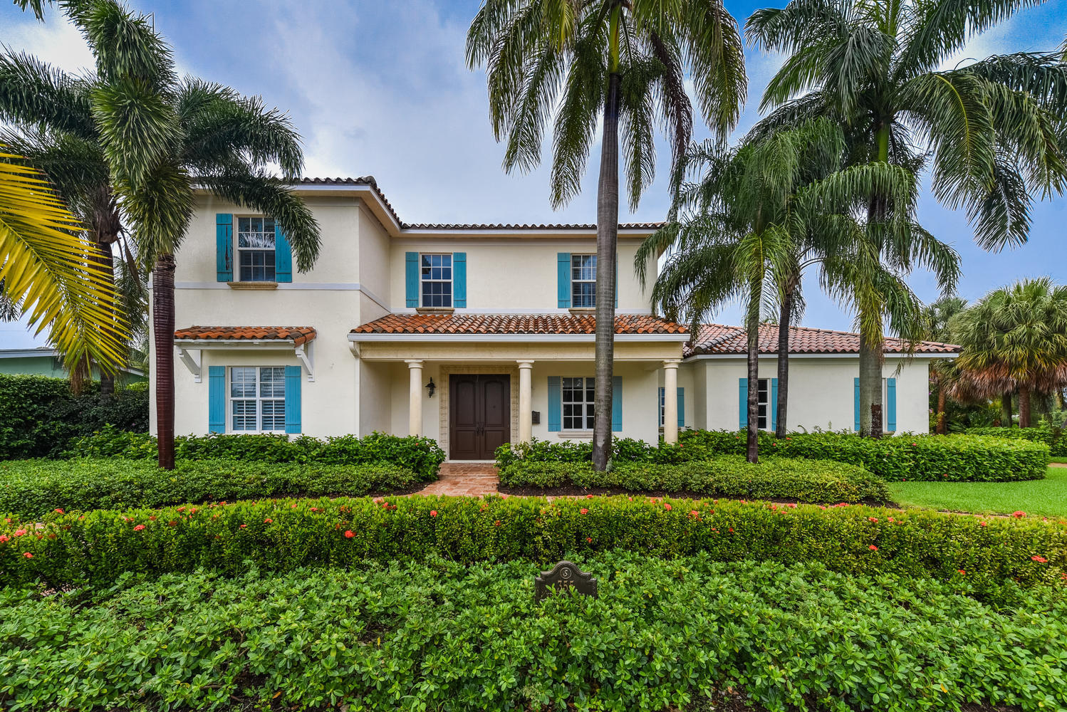 355 Northeast 3rd Court Boca Raton, FL 33432 - Photo 1 of 1 a front view of a house with a garden
