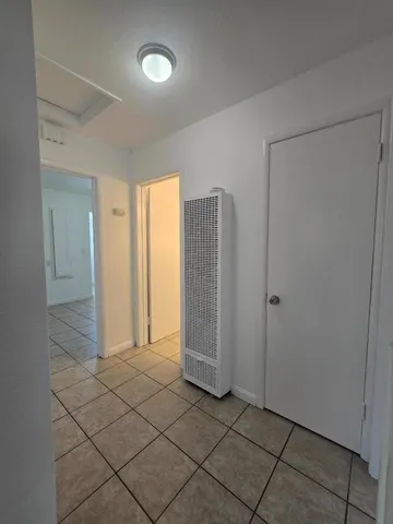 a view of entryway with bathroom