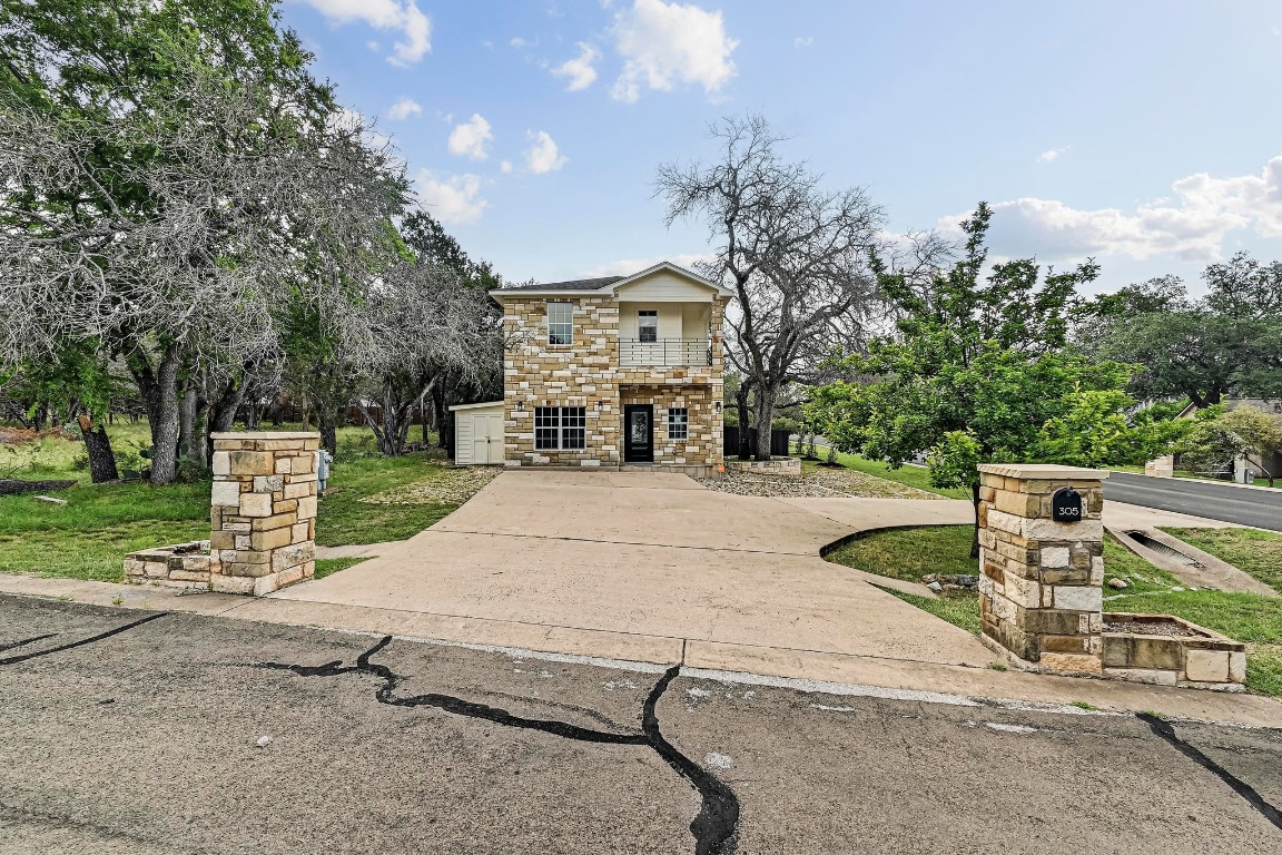 a house with trees in the background