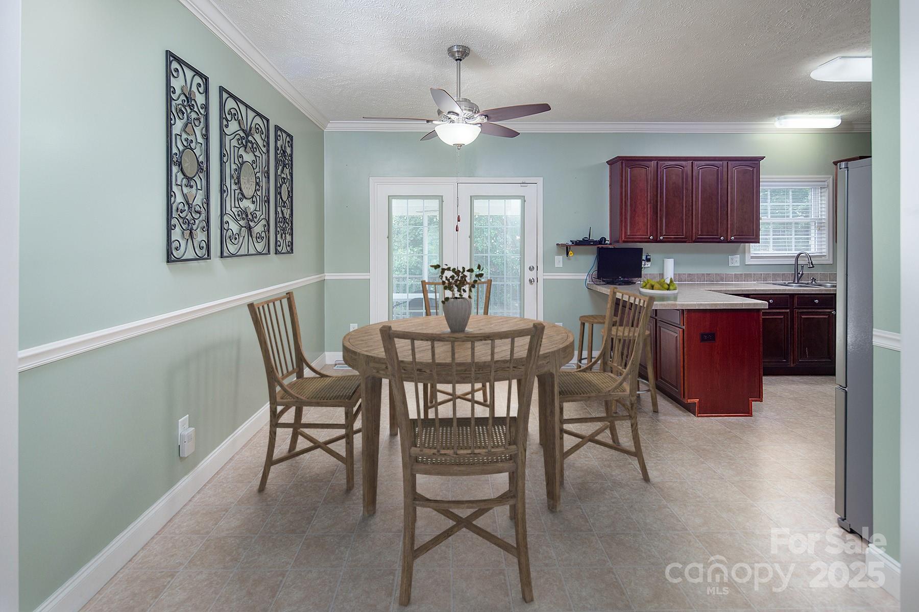 366 Lakehurst Farm Road Norwood, NC 28128 - Photo 14 of 46 a view of a dining room with furniture window and wooden floor