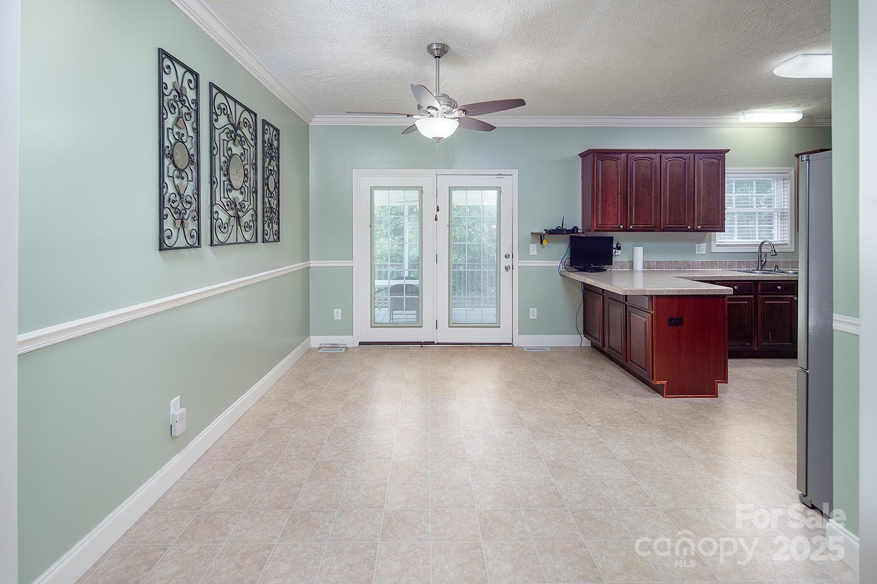 366 Lakehurst Farm Road Norwood, NC 28128 - Photo 15 of 46 a large kitchen with a large window