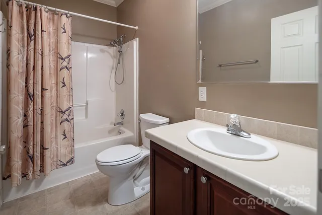 an empty room with windows and entrance