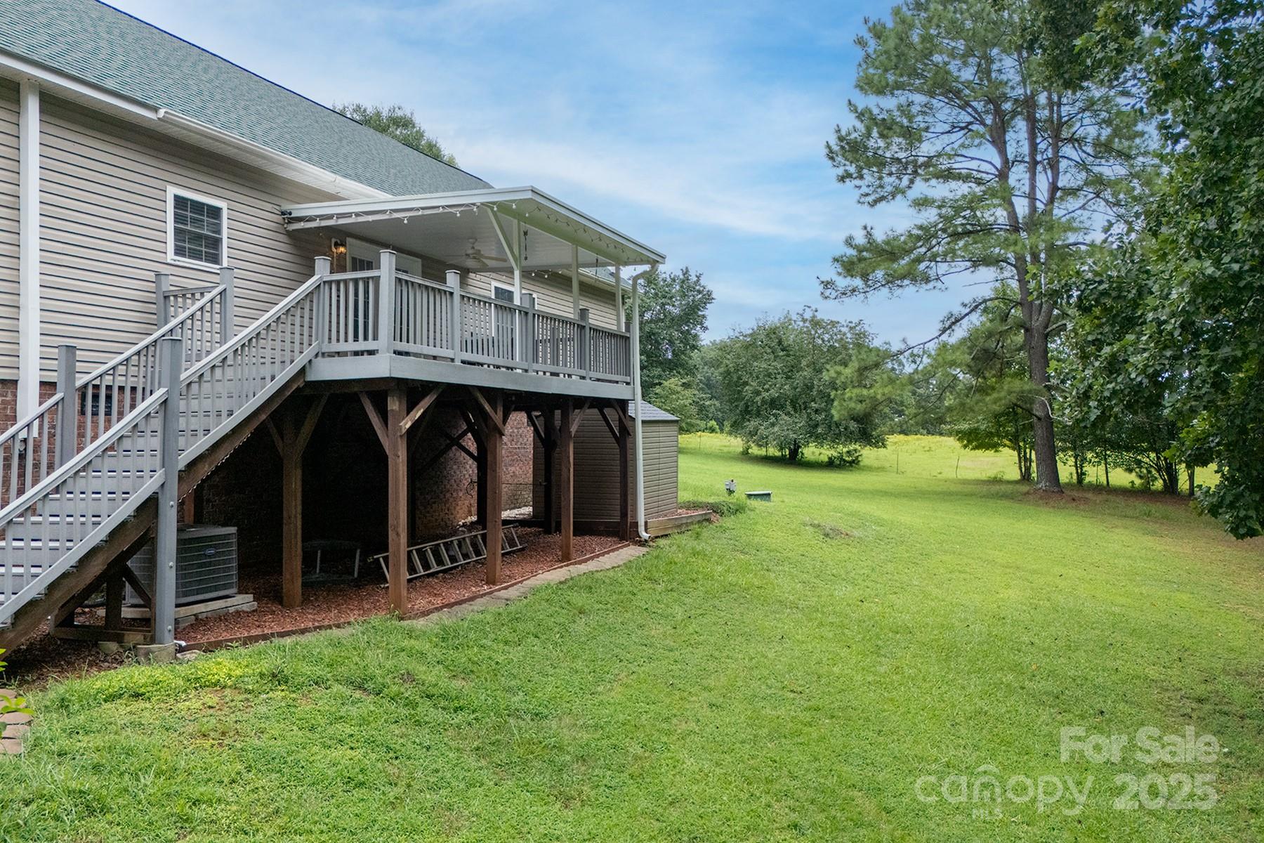 366 Lakehurst Farm Road Norwood, NC 28128 - Photo 39 of 46 a view of an entrance of the house