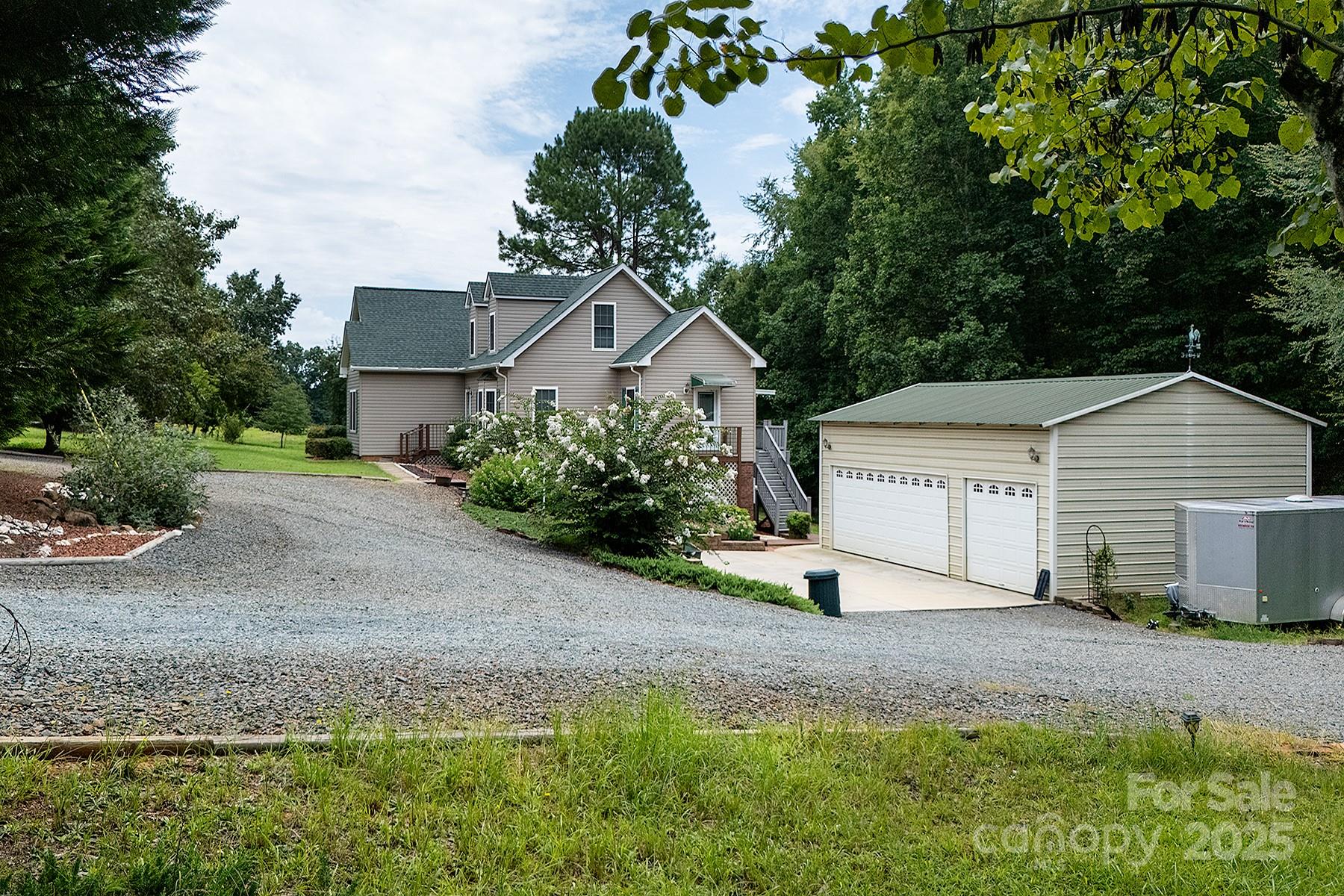 366 Lakehurst Farm Road Norwood, NC 28128 - Photo 45 of 46 a view of a back yard of the house