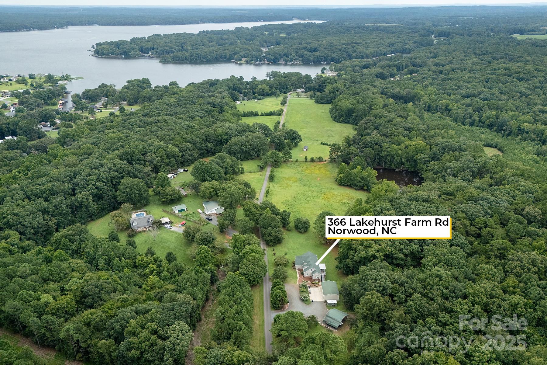 366 Lakehurst Farm Road Norwood, NC 28128 - Photo 8 of 46 an aerial view of a city