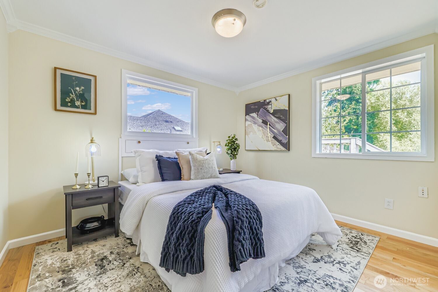 23001 Brier Road Brier, WA 98036 - Photo 12 of 28 a bedroom with a large bed and a window