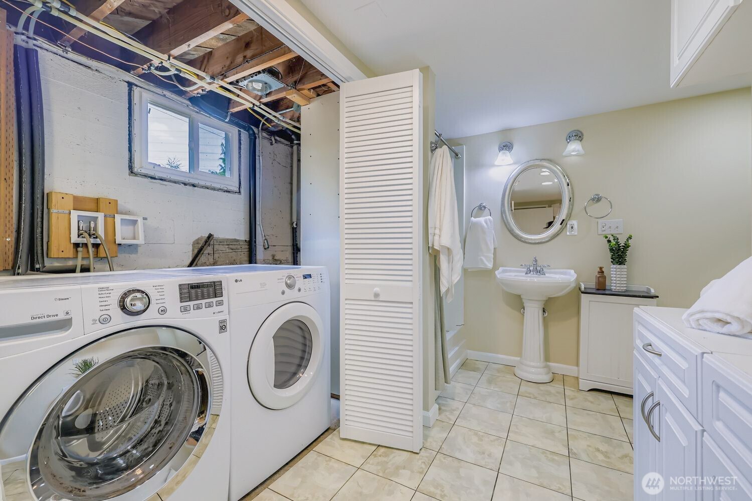 23001 Brier Road Brier, WA 98036 - Photo 24 of 28 a utility room with dryer and washer