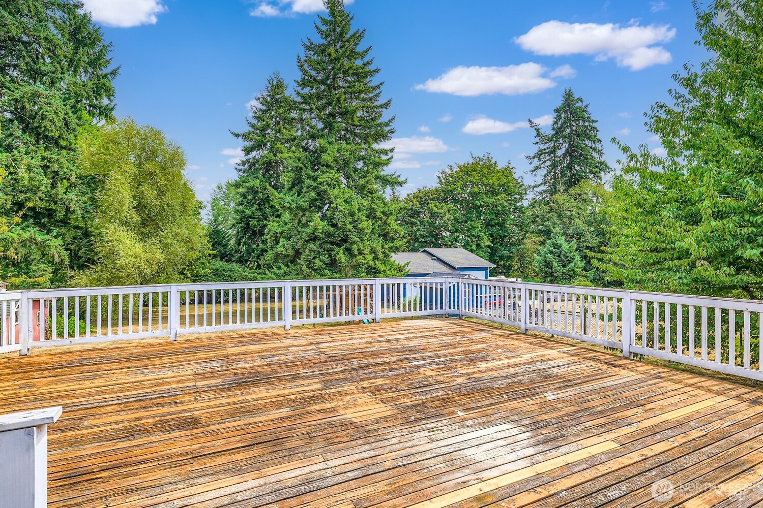 23001 Brier Road Brier, WA 98036 - Photo 25 of 28 a view of a balcony with wooden floor and fence