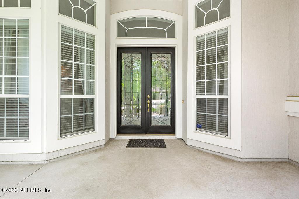 7843 Mt Ranier Drive Jacksonville, FL 32256 - Photo 15 of 116 a view of front door of a house