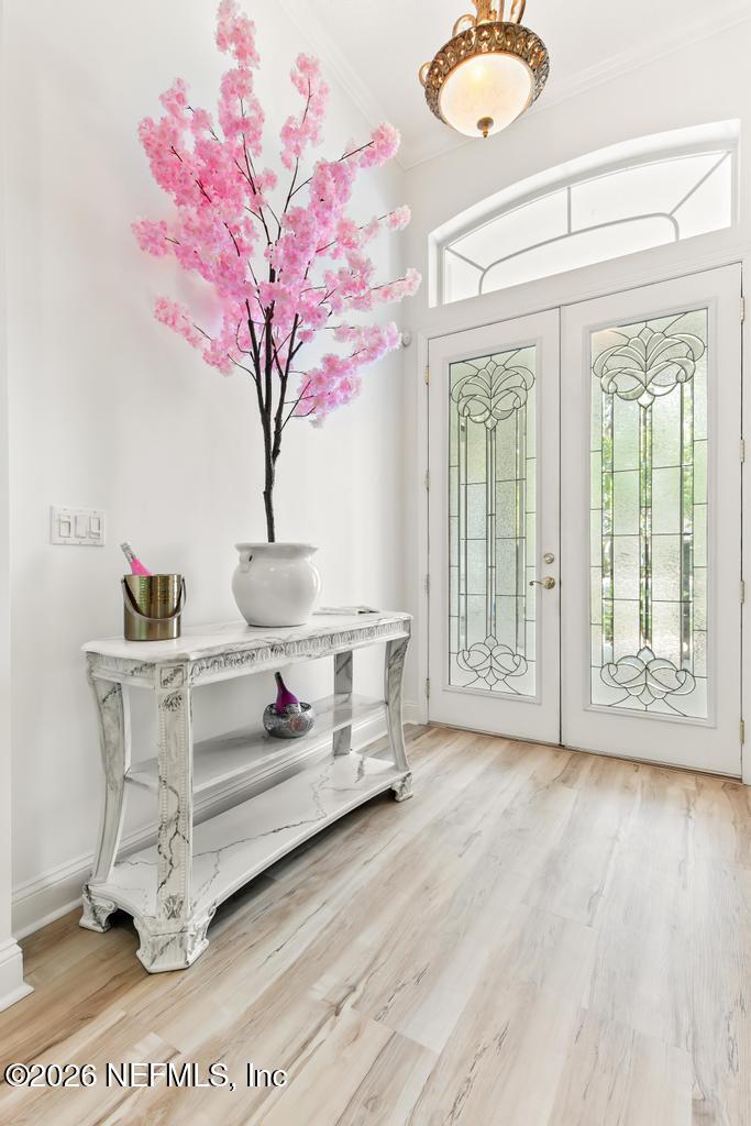 7843 Mt Ranier Drive Jacksonville, FL 32256 - Photo 18 of 116 a living room with furniture and a large window
