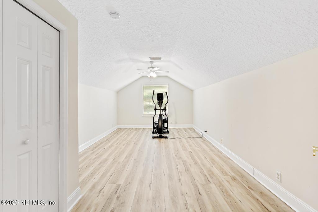 7843 Mt Ranier Drive Jacksonville, FL 32256 - Photo 66 of 116 a view of a room with wooden floor