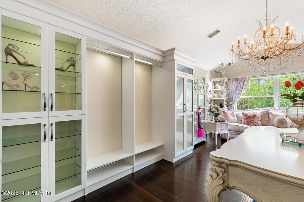 7843 Mt Ranier Drive Jacksonville, FL 32256 - Photo 75 of 116 a view of a livingroom with furniture window and wooden floor
