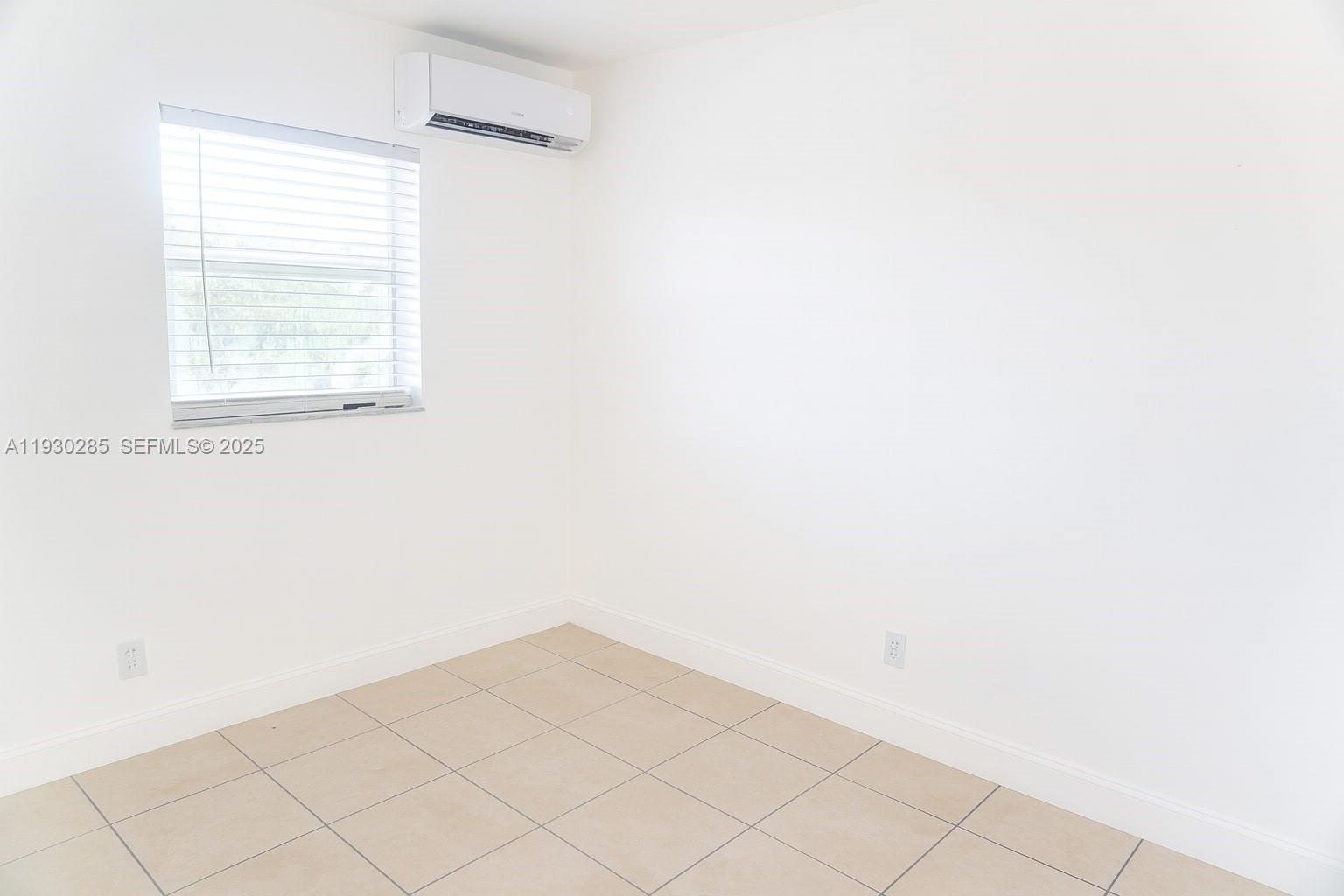 749 Southeast 15th Street, Unit 10 Fort Lauderdale, FL 33316 - Photo 7 of 16 a view of a small space with window