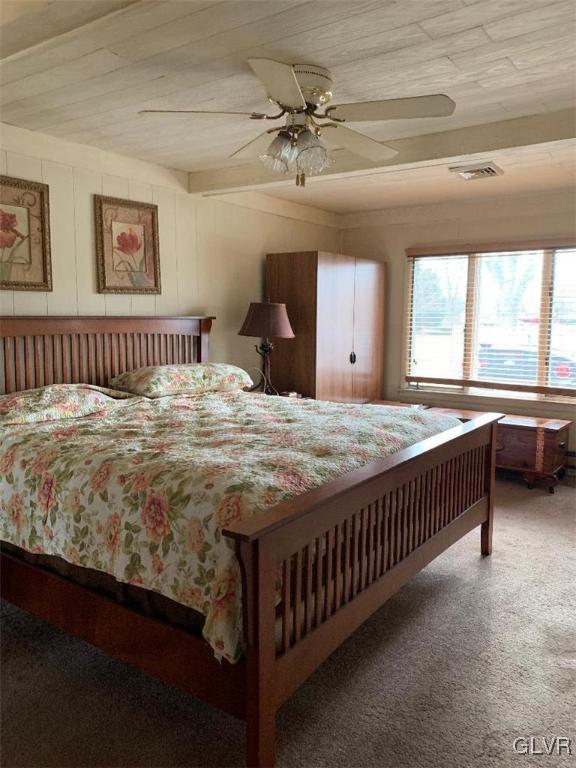 1330 Keller Road Wind Gap, PA 18091 - Photo 12 of 14 a bed sitting in a bedroom next to a window