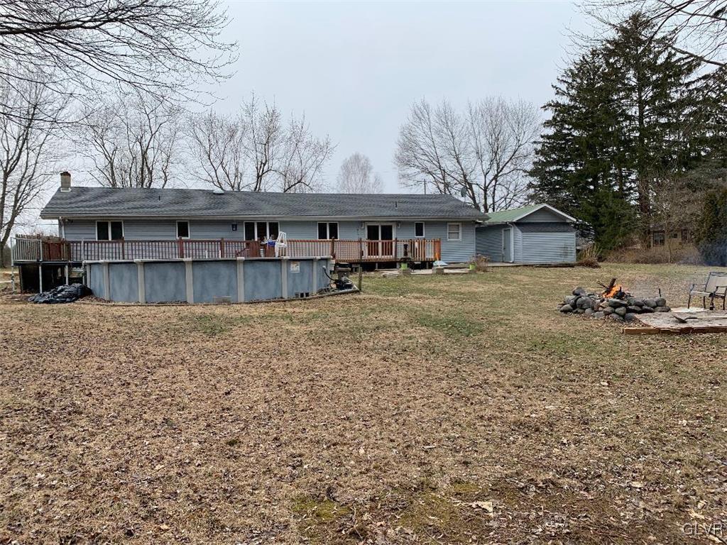 1330 Keller Road Wind Gap, PA 18091 - Photo 2 of 14 a view of a house with a yard covered with snow in front of house