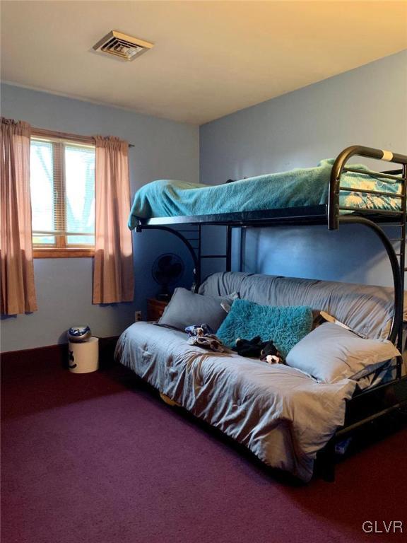 1330 Keller Road Wind Gap, PA 18091 - Photo 9 of 14 a bedroom with a bed and window