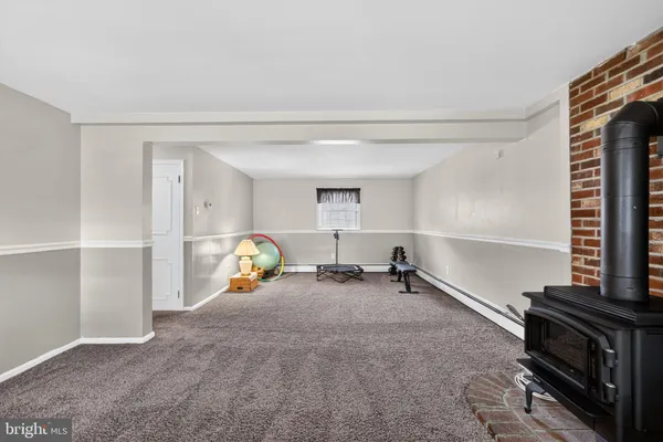 a view of livingroom with furniture and front door