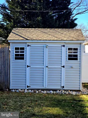 a view of a backyard with a patio