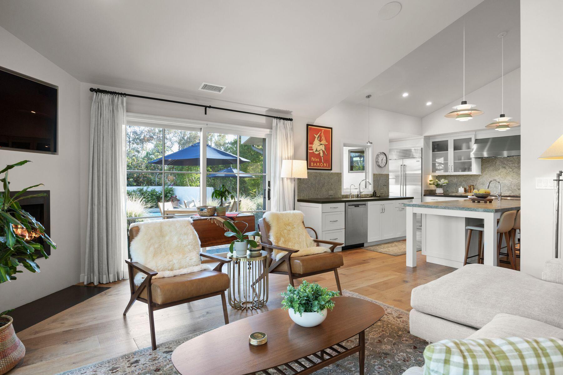10929 Encino Drive Oak View, CA 93022 - Photo 13 of 50 a living room with furniture and a large window