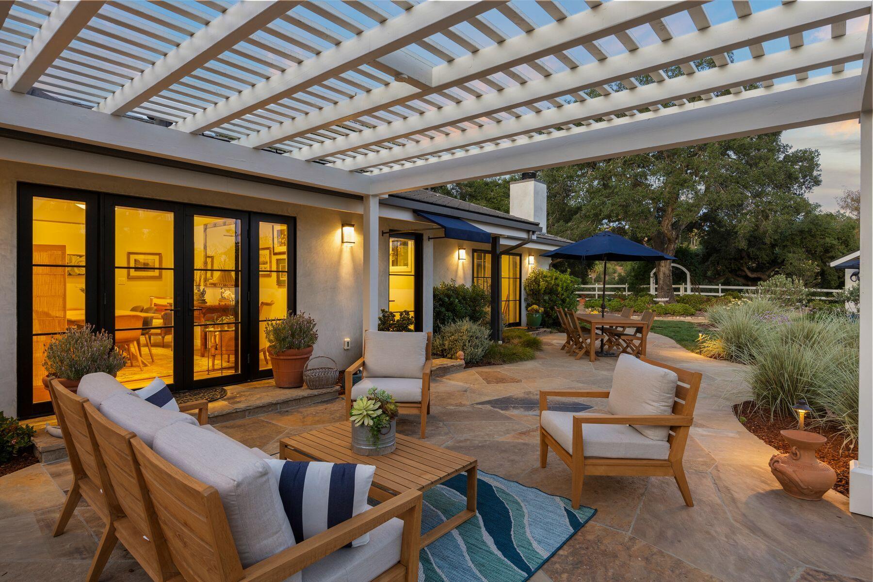 10929 Encino Drive Oak View, CA 93022 - Photo 25 of 50 a building outdoor space with patio furniture and garden view