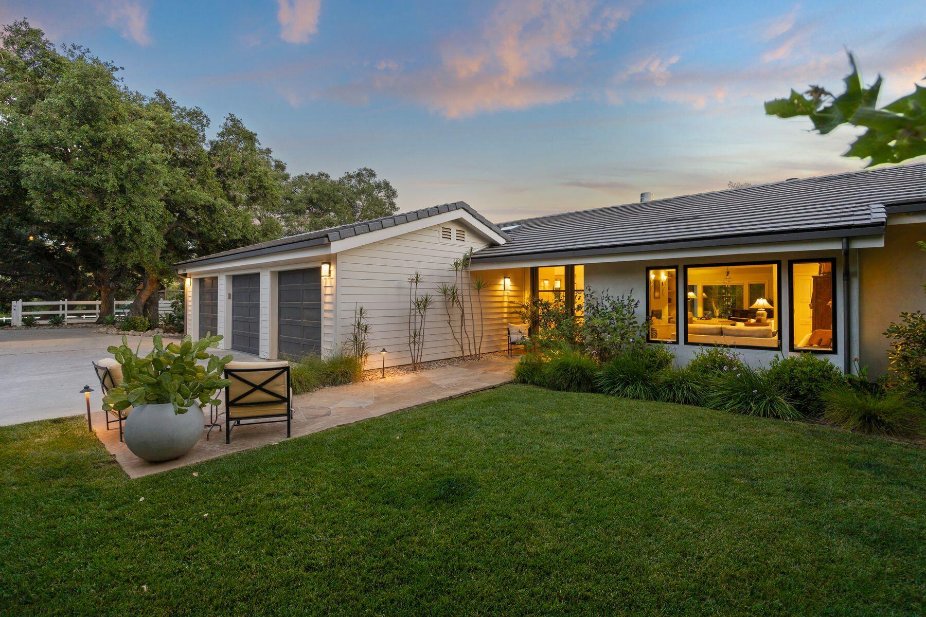 10929 Encino Drive Oak View, CA 93022 - Photo 33 of 50 a backyard of a house with table and chairs