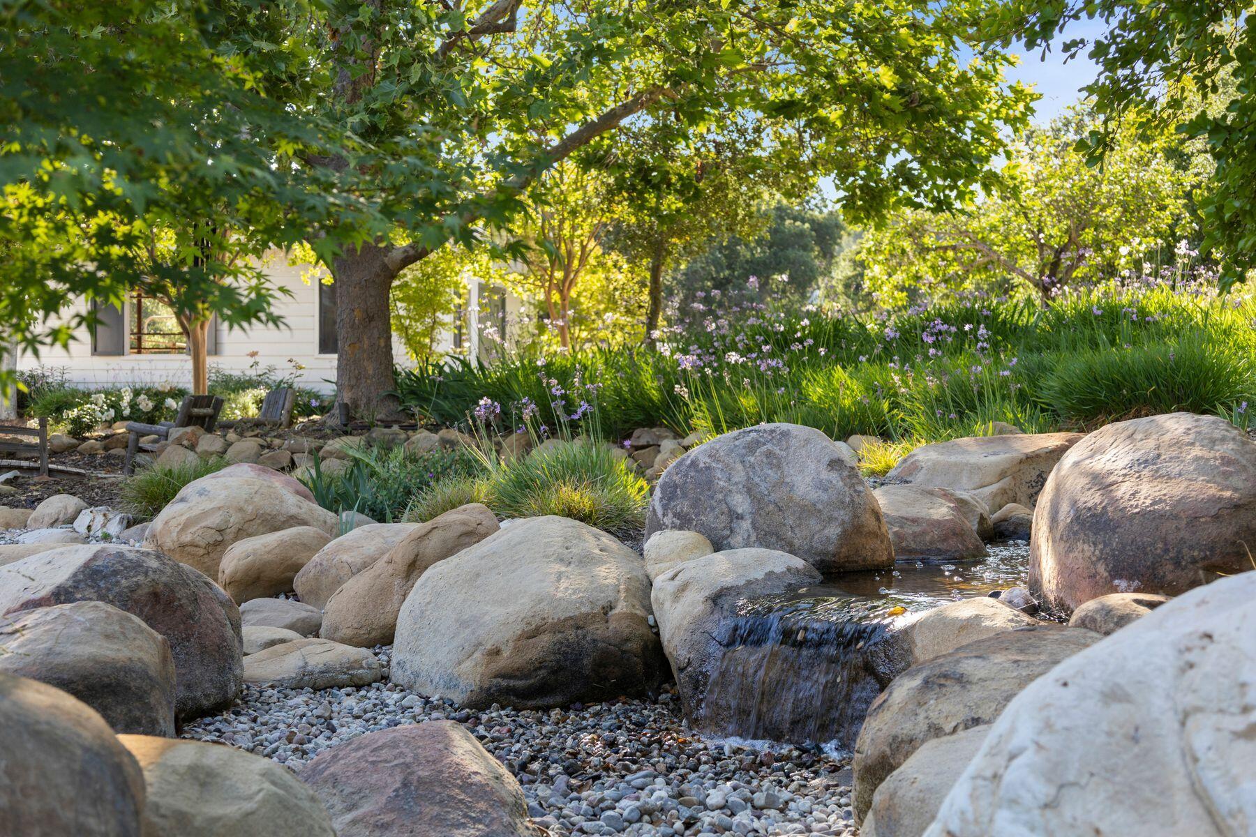 10929 Encino Drive Oak View, CA 93022 - Photo 37 of 50 a couple of cars parked in a parking lot