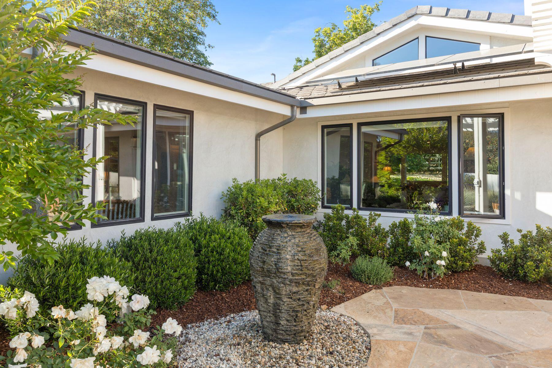10929 Encino Drive Oak View, CA 93022 - Photo 38 of 50 front view of house with potted plants