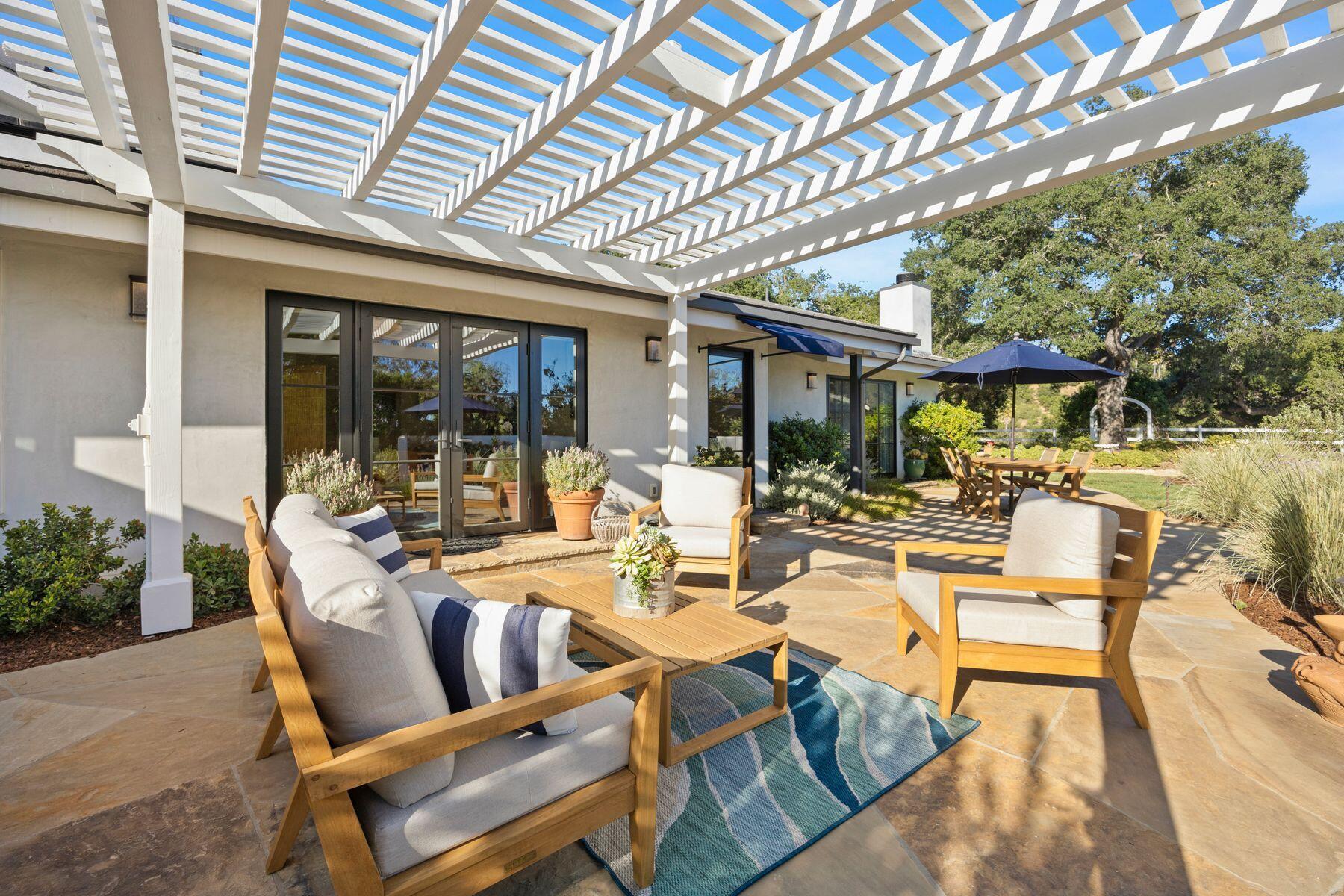 10929 Encino Drive Oak View, CA 93022 - Photo 39 of 50 a view of a patio with chairs and tables