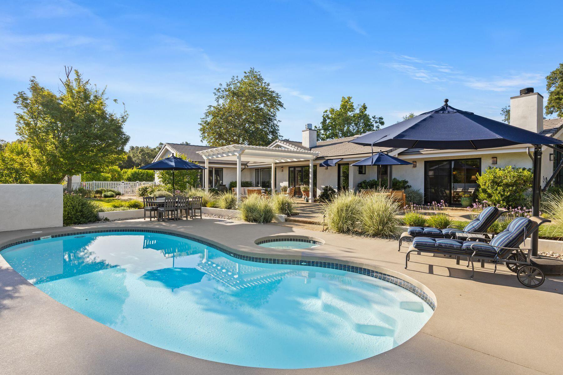 10929 Encino Drive Oak View, CA 93022 - Photo 40 of 50 a view of a house with swimming pool and sitting area