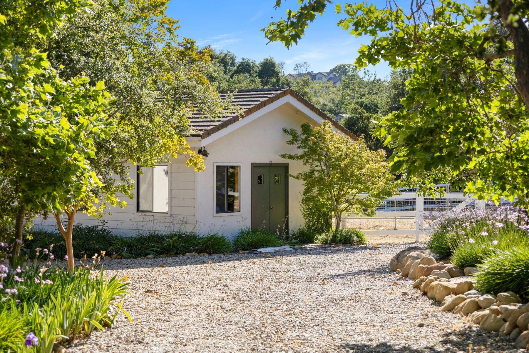 10929 Encino Drive Oak View, CA 93022 - Photo 48 of 50 a front view of a house with a yard and tree