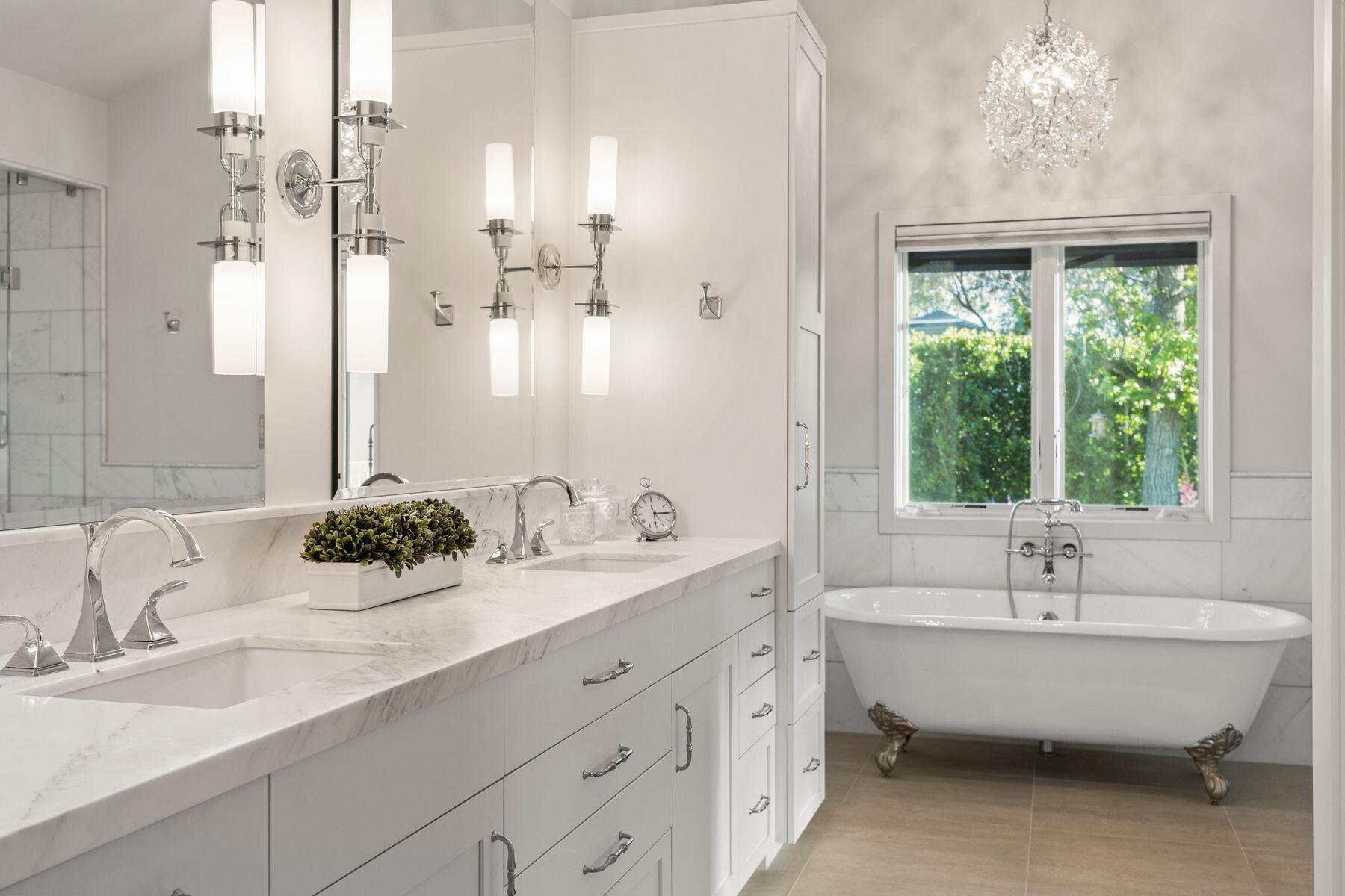 10929 Encino Drive Oak View, CA 93022 - Photo 5 of 50 a spacious bathroom with a double vanity sink a mirror and a bathtub