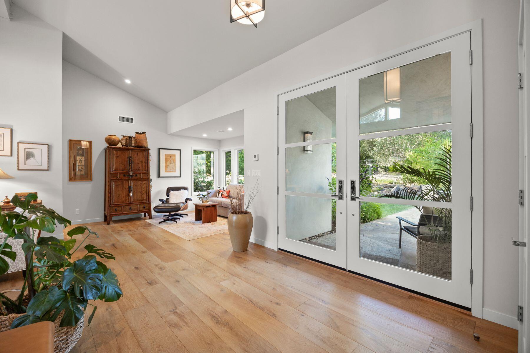 10929 Encino Drive Oak View, CA 93022 - Photo 7 of 50 a living room with furniture and a potted plant