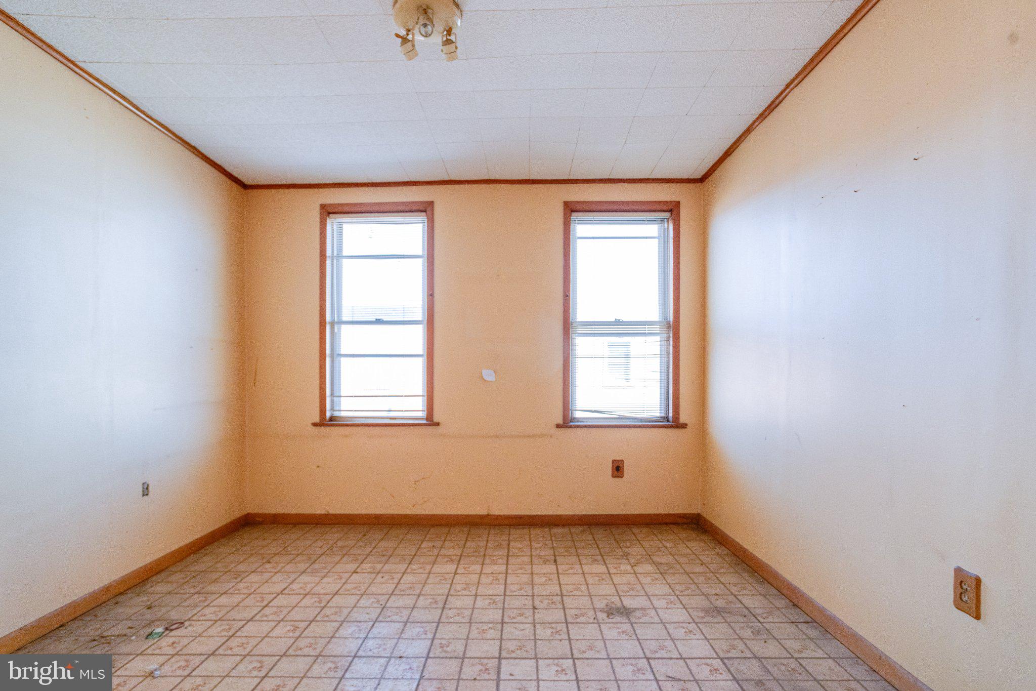38 South Curley Street Baltimore, MD 21224 - Photo 24 of 38 an empty room with windows
