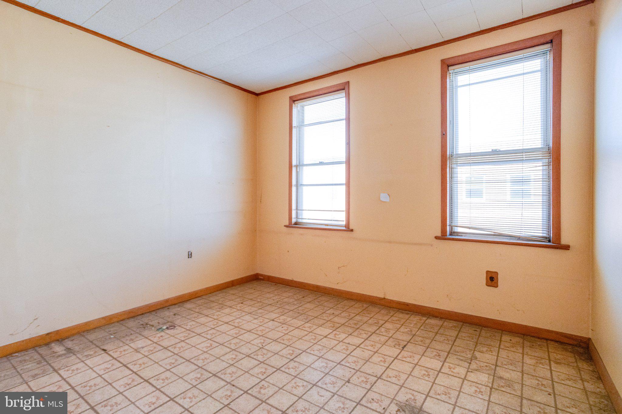 38 South Curley Street Baltimore, MD 21224 - Photo 25 of 38 an empty room with windows