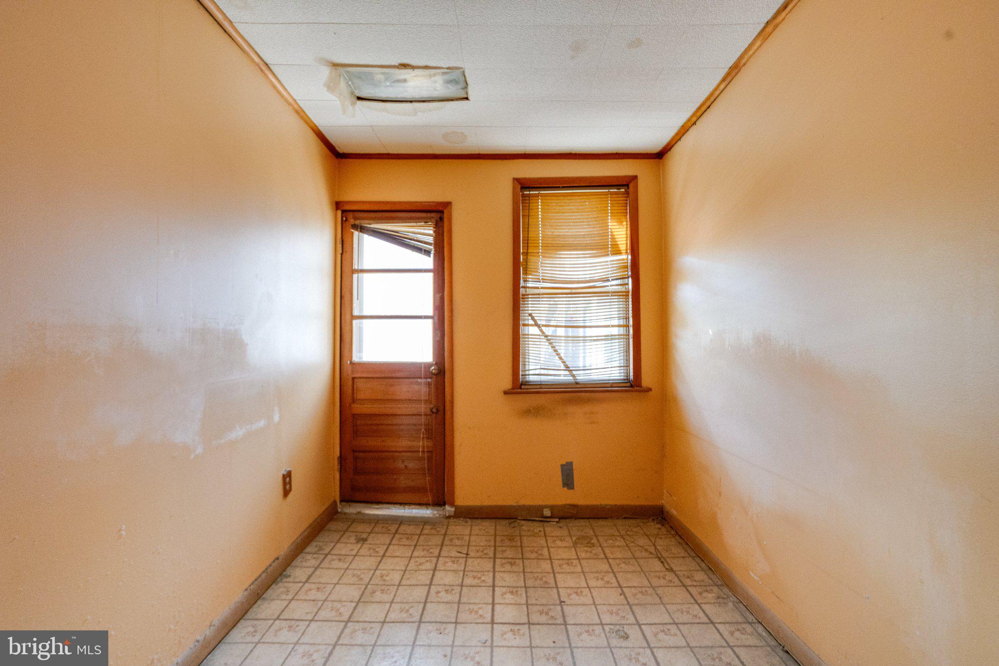 38 South Curley Street Baltimore, MD 21224 - Photo 31 of 38 a view of an empty room with window