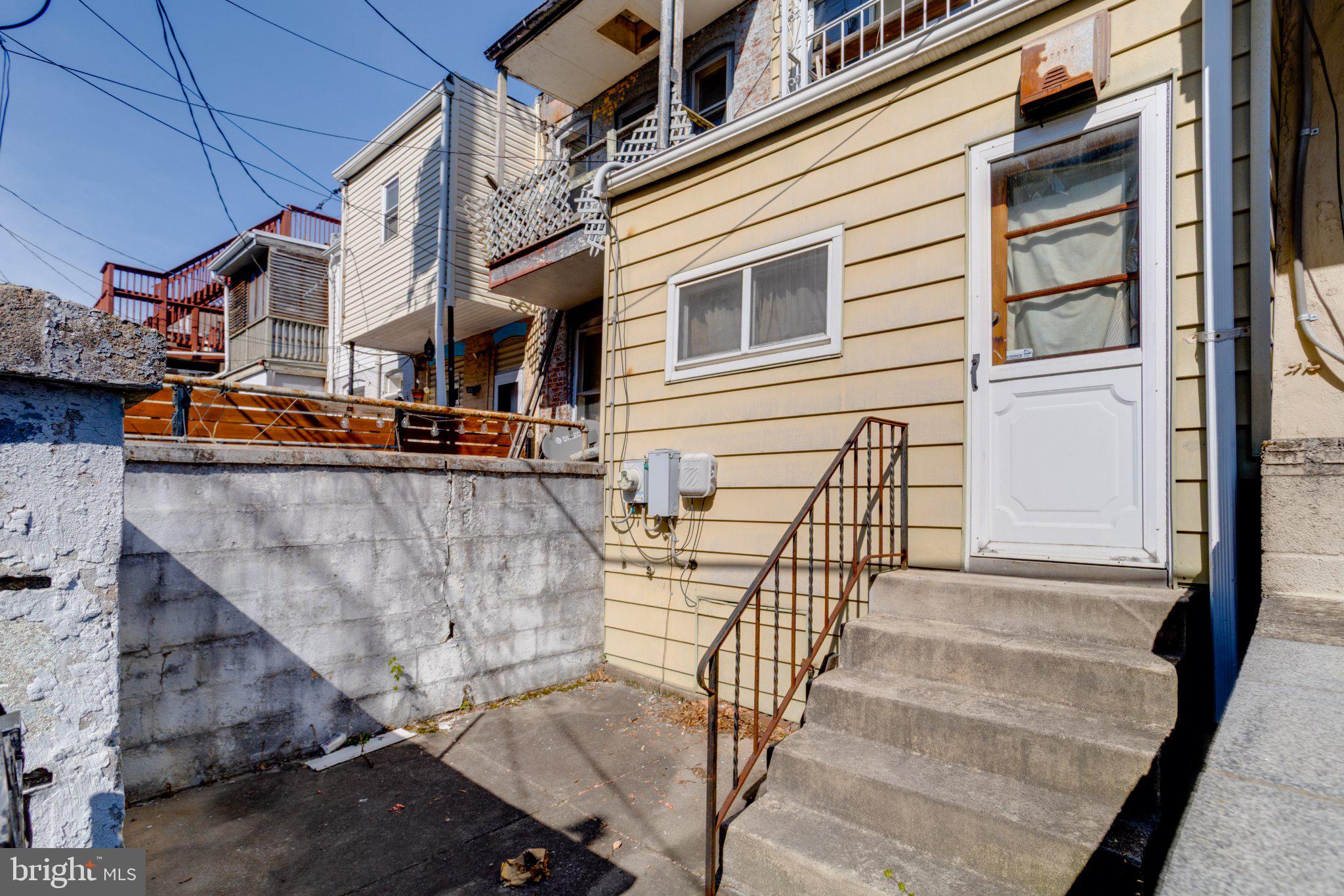 38 South Curley Street Baltimore, MD 21224 - Photo 37 of 38 a view of a house with a street
