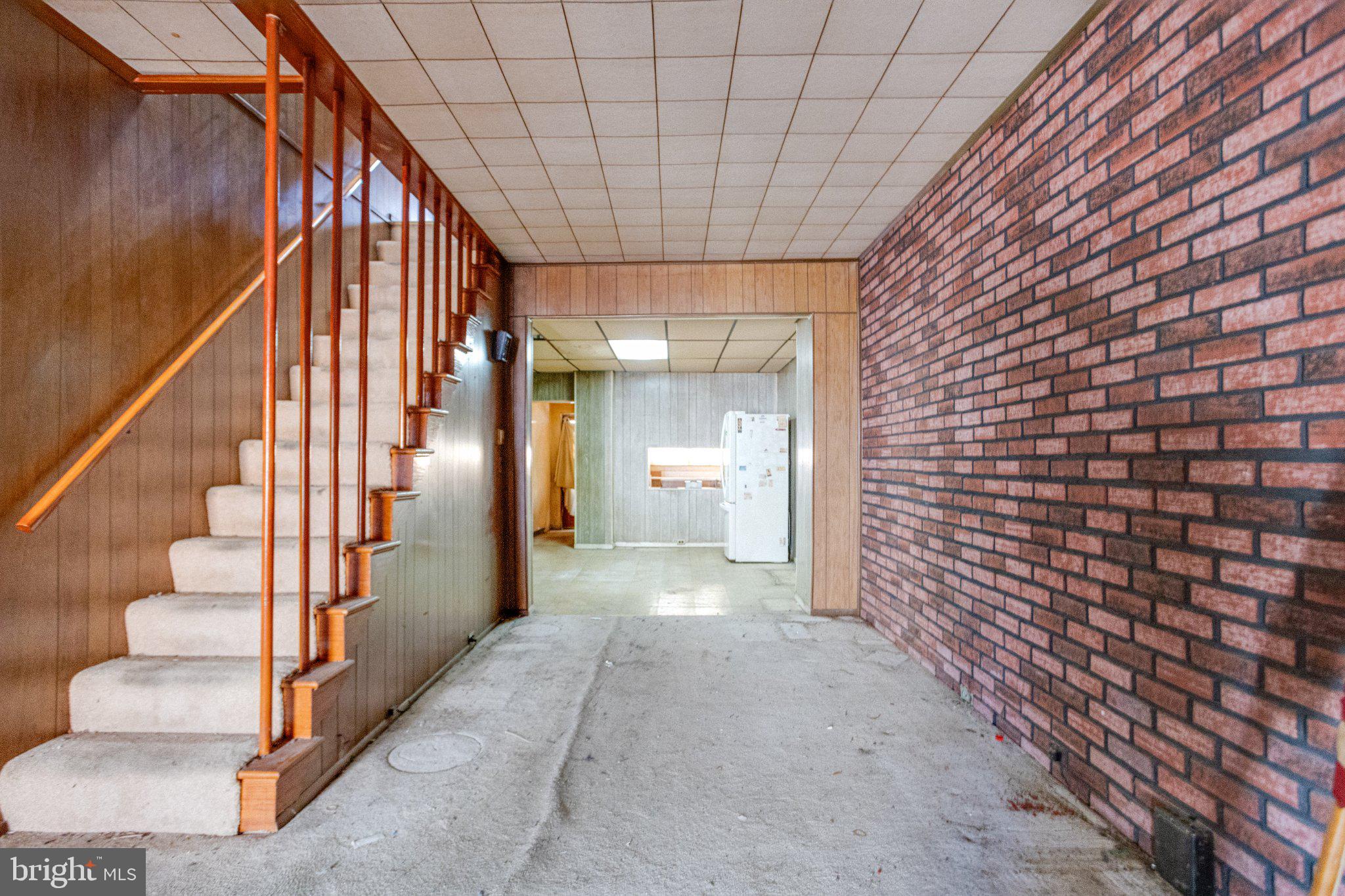 38 South Curley Street Baltimore, MD 21224 - Photo 7 of 38 a view of a hallway with staircase