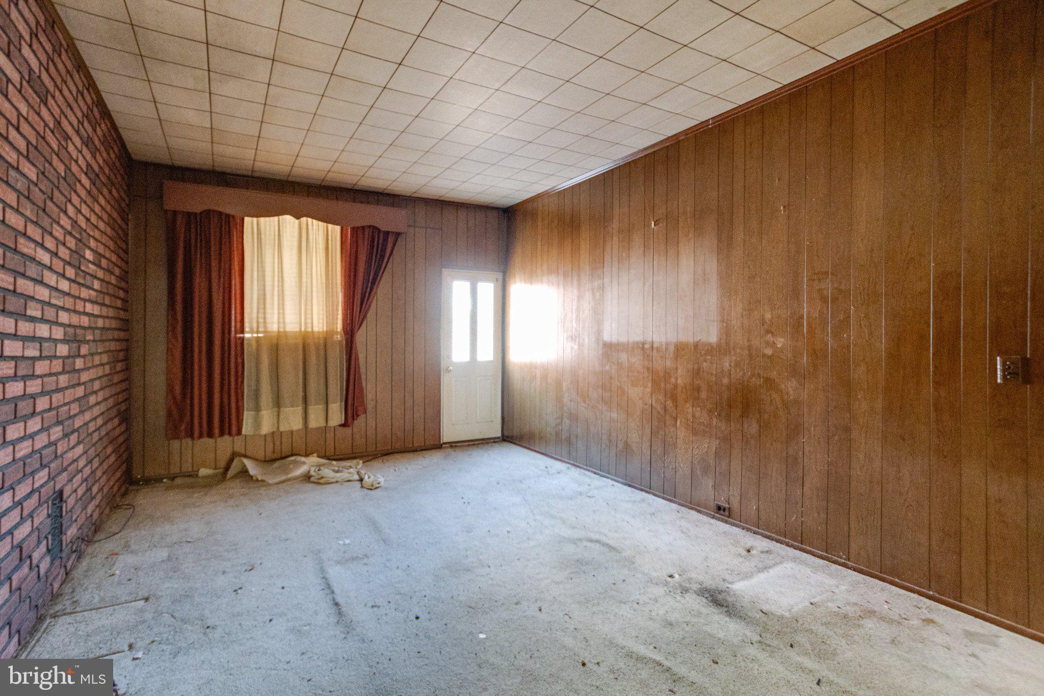 38 South Curley Street Baltimore, MD 21224 - Photo 10 of 38 an empty room with windows