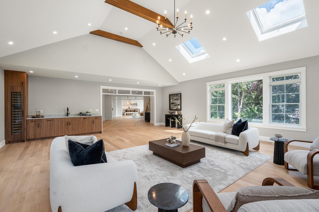 53 Crestview Road Belmont, MA 02478 - Photo 11 of 42 a living room with furniture and a large window