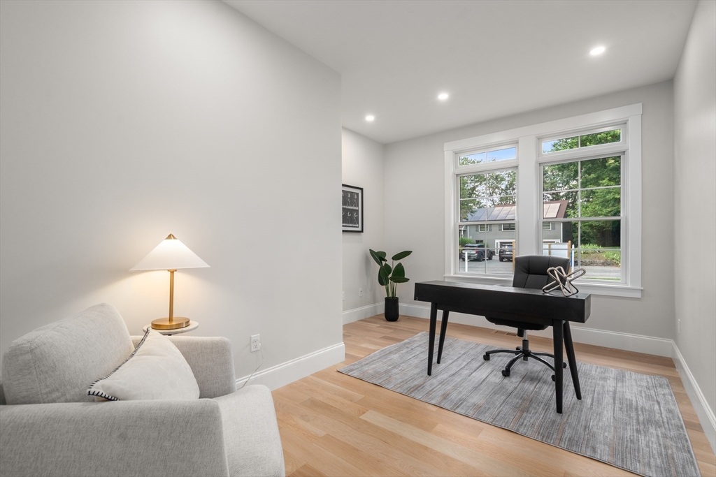 53 Crestview Road Belmont, MA 02478 - Photo 22 of 42 a living room with furniture and a table